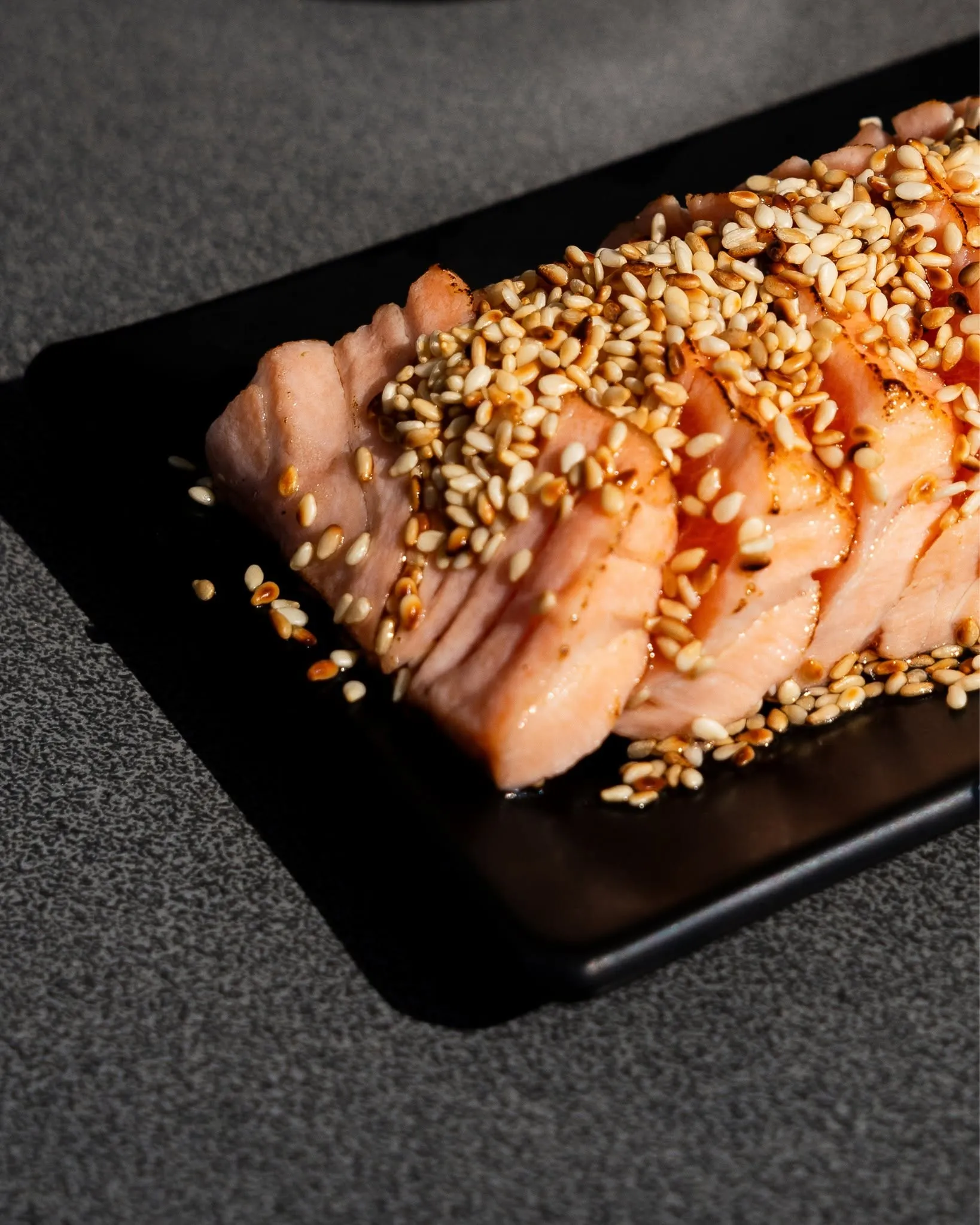 Salmon tataki – delicate inside, lightly kissed by the flame on the outside ✨